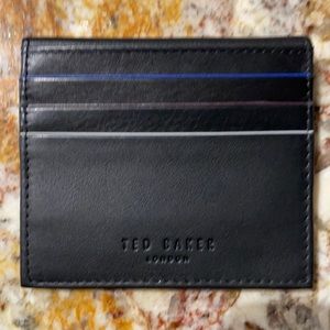 New, never-used Ted Baker wallet. Purchased in London. Ideal traveling piece!
